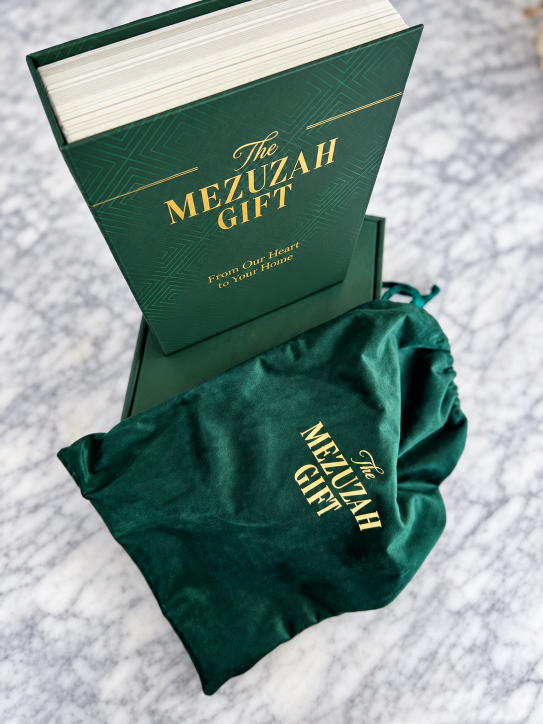 Angled view of The Mezuzah Gift presentation case and velvet pouch