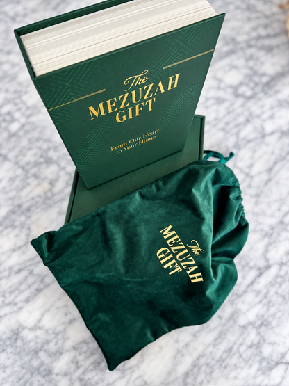 Angled view of The Mezuzah Gift presentation case and velvet pouch