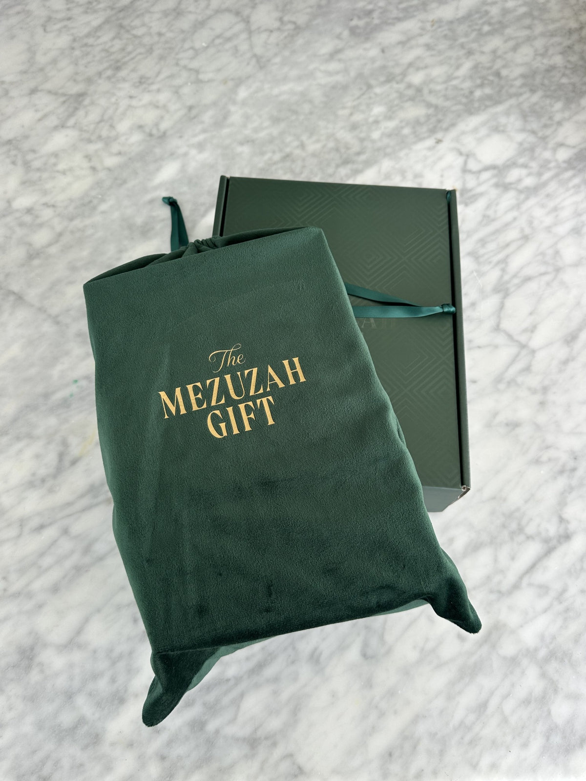 Outer shipping box and branded velvet pouch